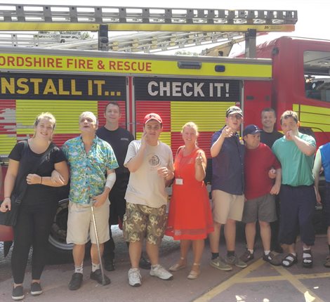 Group with fire engine